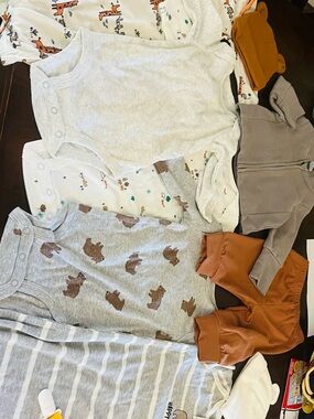 Gerber 0-6 months 2 sleepers 3 long sleeve body suits 1 pair of pants a jacket